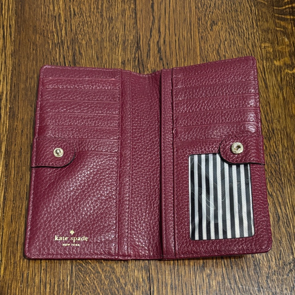 kate spade Burgundy Pebbled Leather Continental Wallet with Gold Logo - Picture 2 of 3